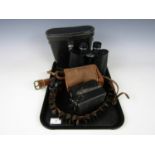 A cased pair of Zenith Special binoculars, together with a cased Kodak Brownie camera and manual,