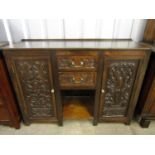 A 19th Century and later carved oak sideboard (modified)