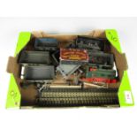Various tin plate model railway rolling stock together with track etc