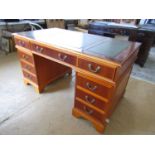 A reproduction pedestal desk, ex Vaseys