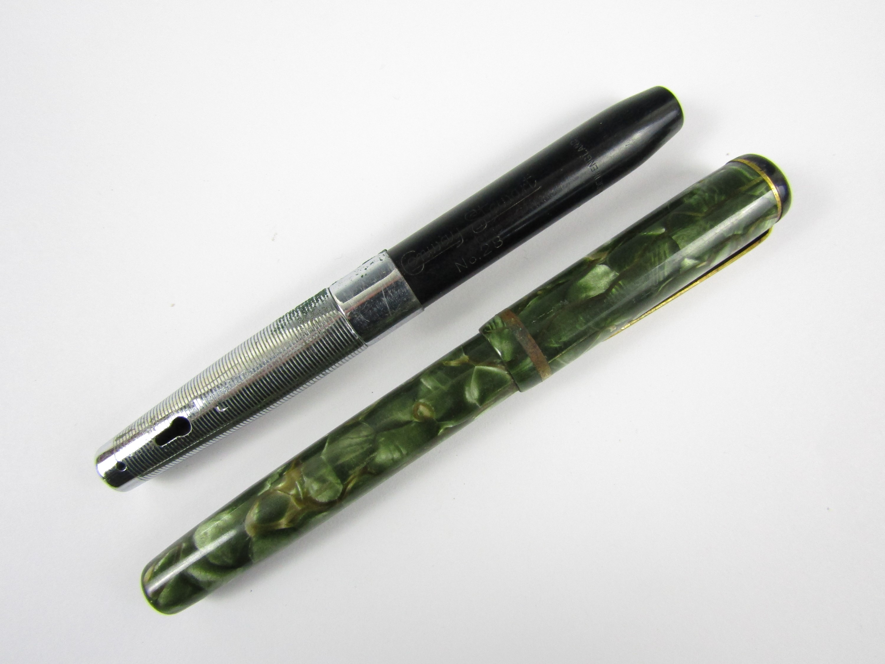 A vintage Selfridges fountain pen together with one other