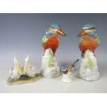 Four various bird figurines
