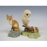 A Border Fine Arts figurine of an owl and a field mouse, together with one further Border Fine