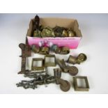 A quantity of brass ware including barrel taps, furniture mounts and a bell etc