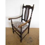 A Victorian oak arm chair