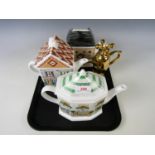 Three Ringtons cottage tea pots together with one other novelty hot water jug
