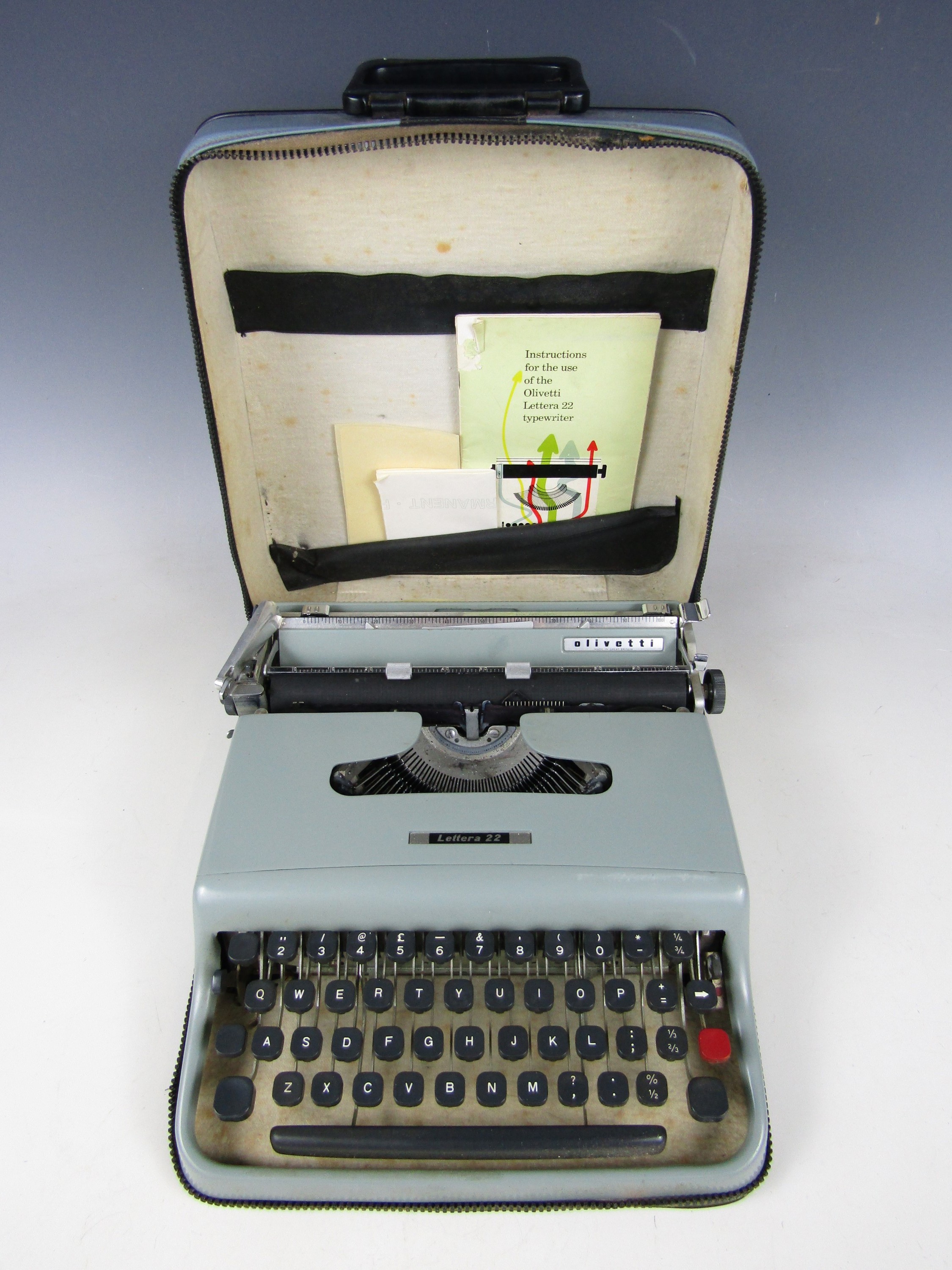 A cased Olivetti Lettera 22 portable typewriter