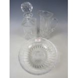 Three pieces of cut crystal including a bowl, a decanter and a jug