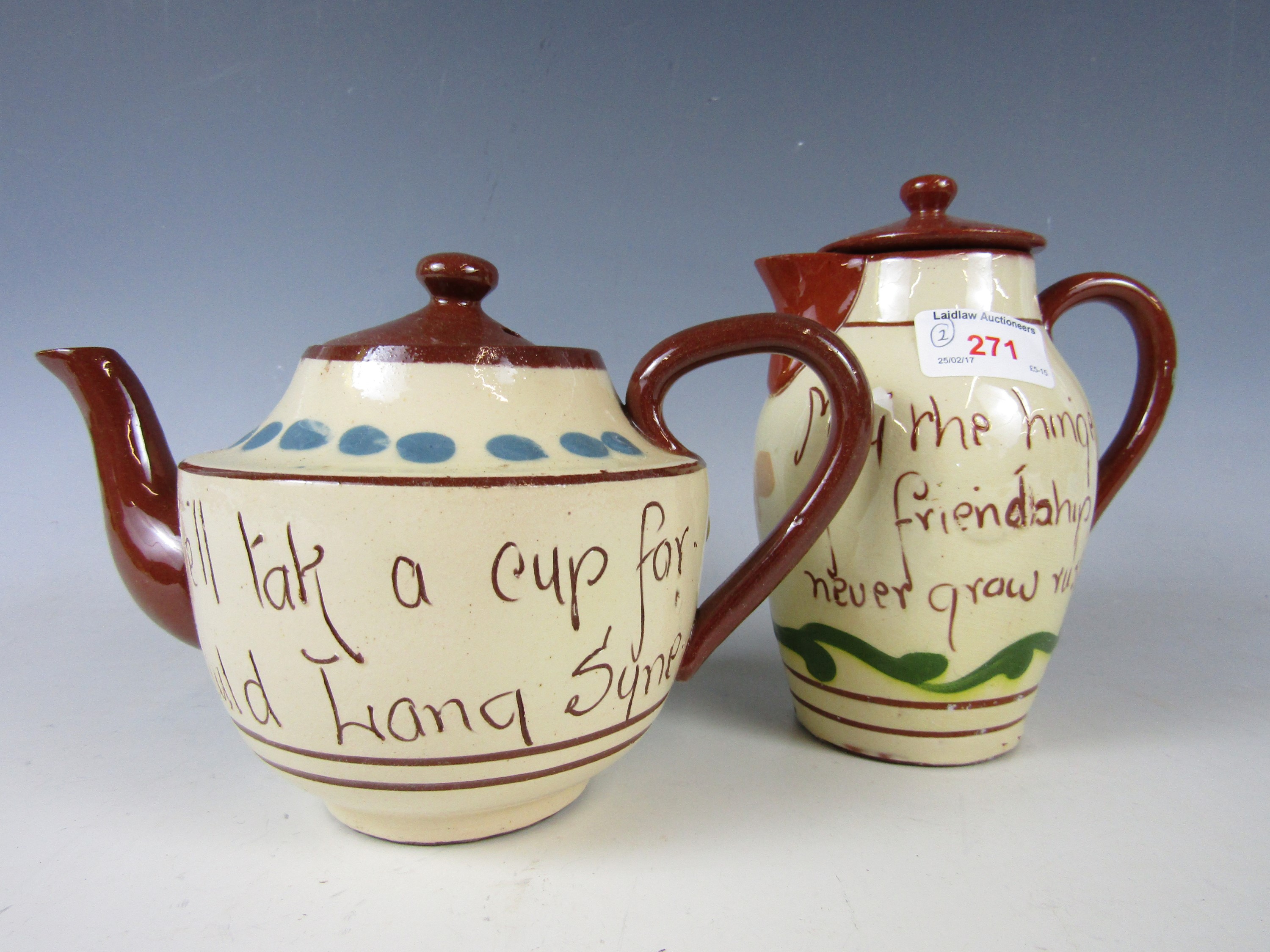 A Devon pottery teapot together with a water pot