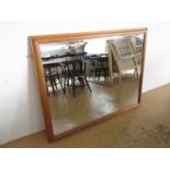 A large pine framed contemporary wall mirror, 134 x 104 cm