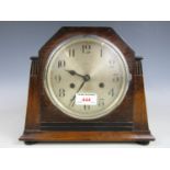 An Enfield oak cased mantel clock