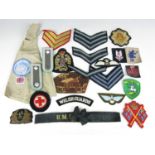 A quantity of military and other cloth insignia