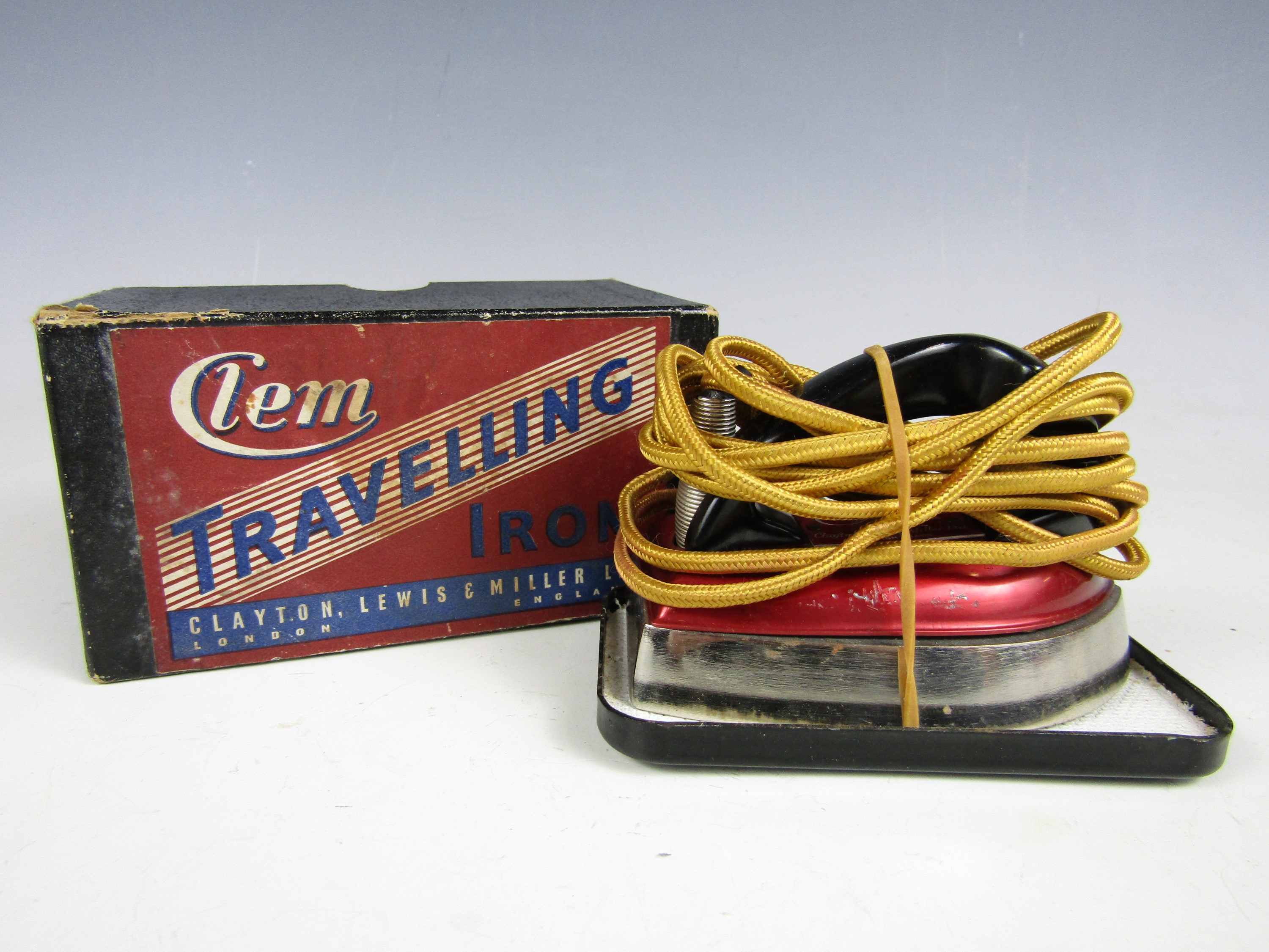 A vintage boxed Clem travelling iron