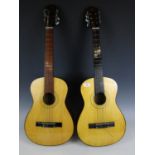Two Kapok children's guitars