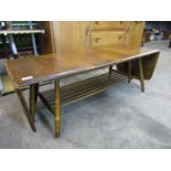 An Ercol oak drop leaf coffee table, 160 x 36 x 45 cm