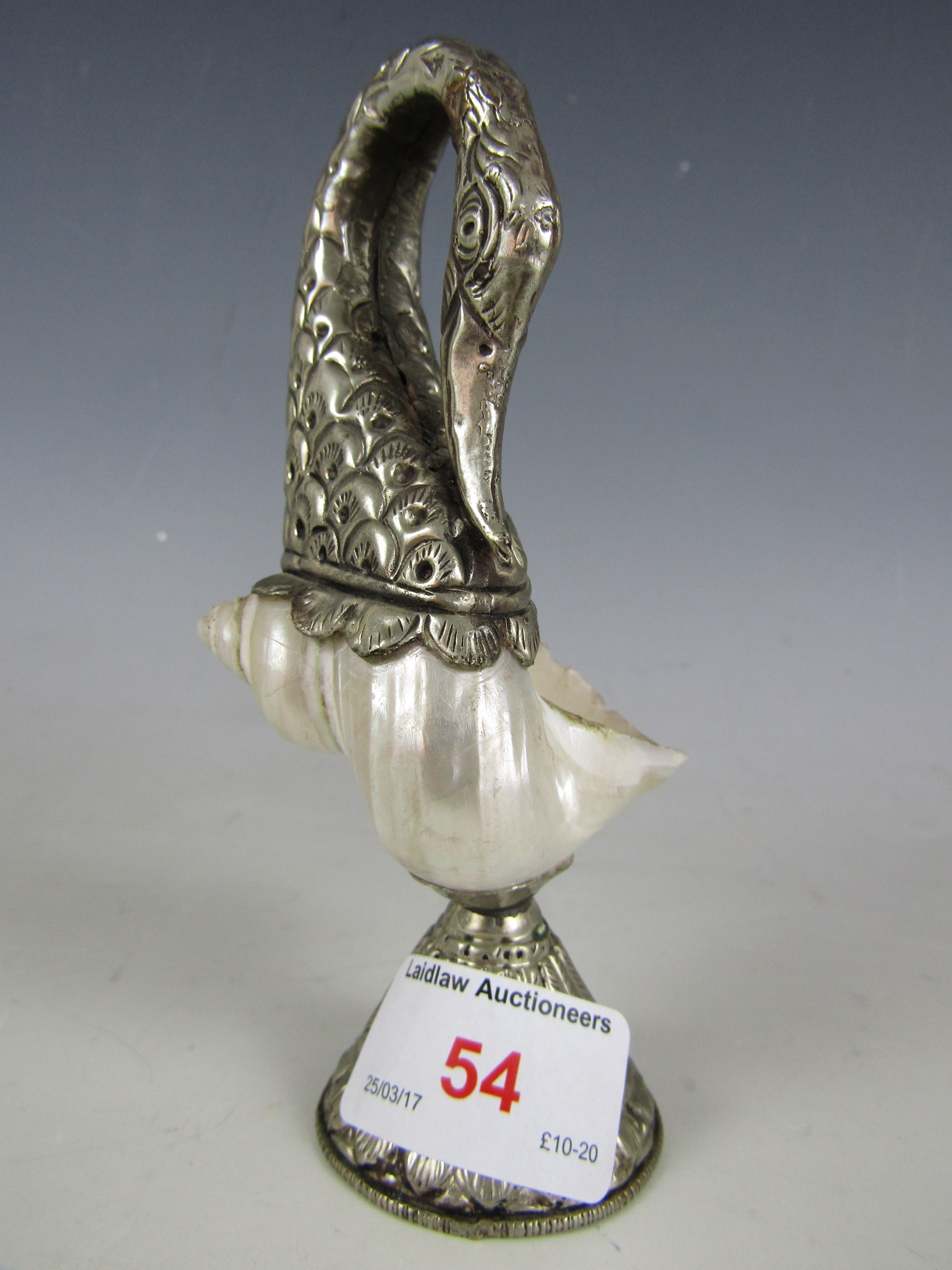 A South Asian nickel mounted seashell modelled in the form of a stork