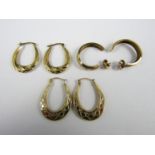 Three pairs of contemporary yellow-metal hoop earrings, two pairs stamped 925, test as gold, 3.4g