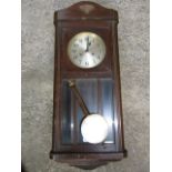 A mahogany cased wall clock