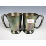 A pair of Walker and Hall electroplate tankards