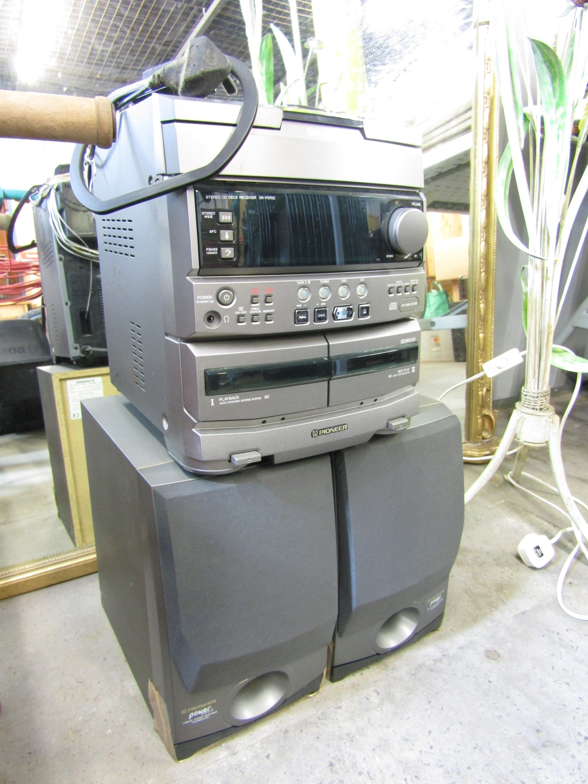 A Pioneer CD player and speakers