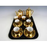 A Royal Worcester gold lustre coffee service