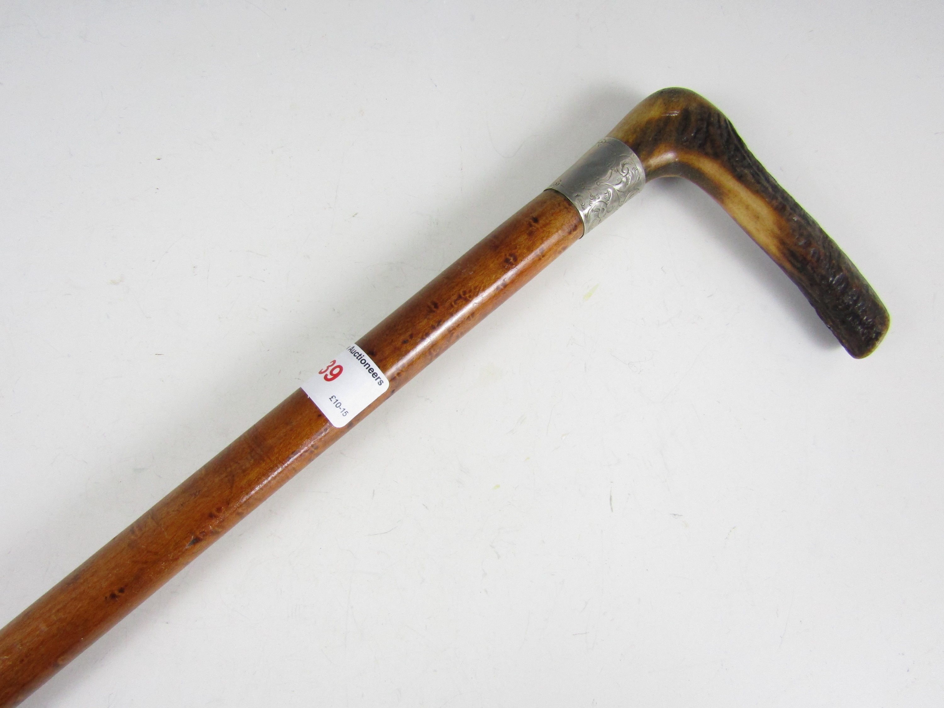 A vintage antler handled walking stick