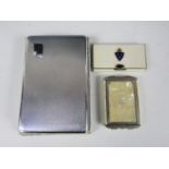 A small Girey powder compact together with a card case and a boxed cigarette case