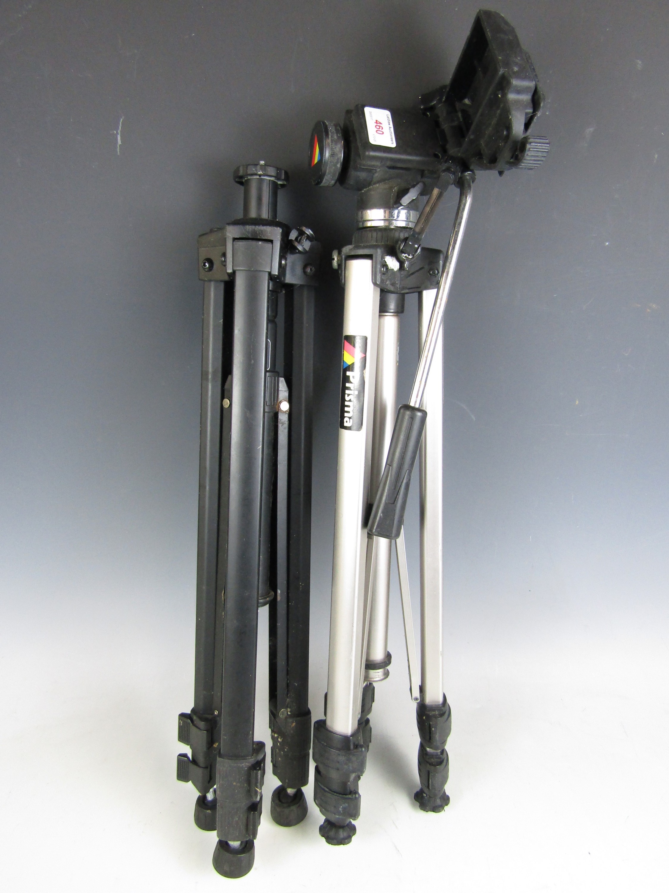 Two camera tripods including a Prisma and a Velbon D-600