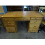 A contemporary pine office desk, 136 x 77 x 66 cm