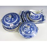 A quantity of Corona ware Willow pattern dinnerware