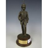 A cold cast bronze sculpture of a Royal Horse Artillery trooper, 26 cm high