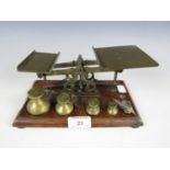 Antique brass postal scales with weights
