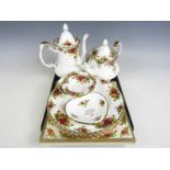 A quantity of Royal Albert Old Country Roses tea ware including a teapot, coffee pot and plates etc