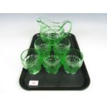 A vintage Jacobean pattern uranium glass lemonade set