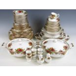 An extensive collection comprising 100 items of Royal Albert Old Country Rose pattern