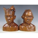 A pair of Balinese wooden busts