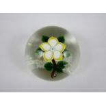 A John Deacon yellow wood anemone paperweight