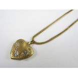 A vintage 9ct gold heart-shaped locket on a 9ct gold foxtail link neck chain, 6g total