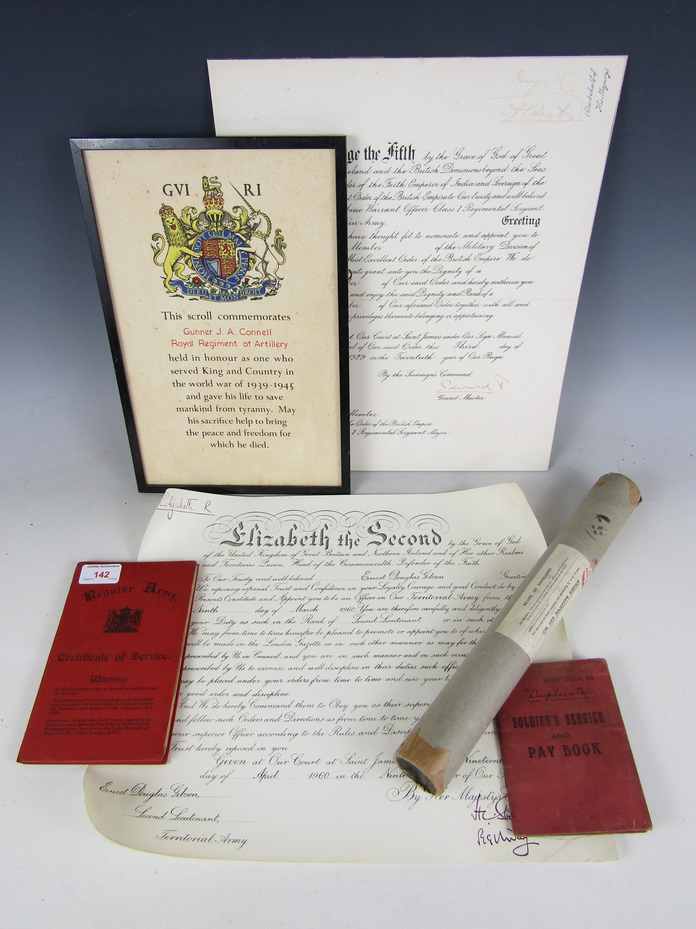 A WWII casualty memorial scroll, unrelated Pay Book and Service Certificate, an Army commission