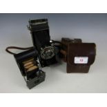 A vintage Pronto folding camera together with an Eastman Kodak camera