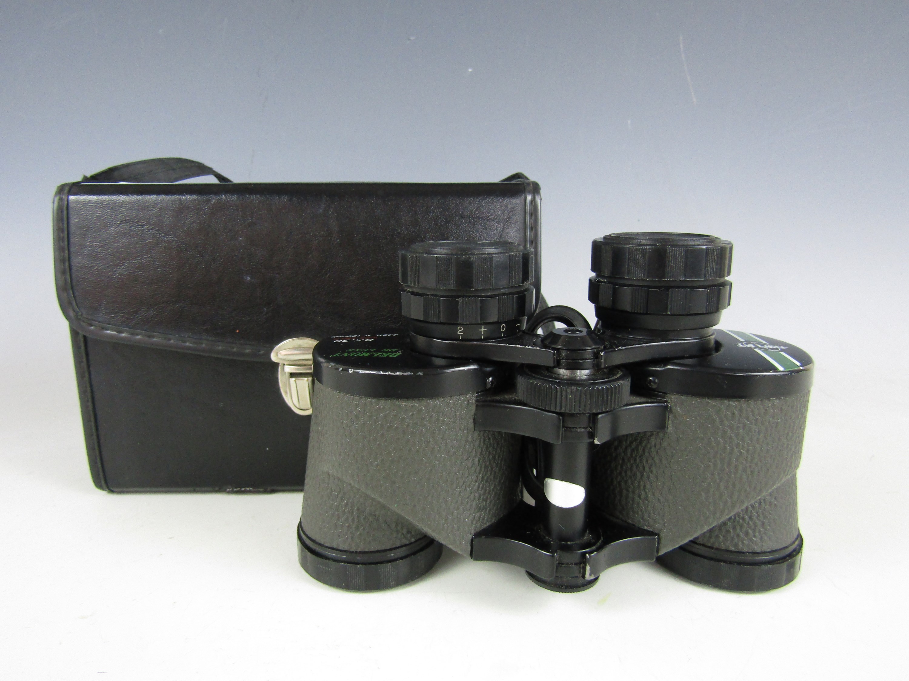 A cased pair of Swift 8x30 binoculars