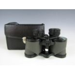 A cased pair of Swift 8x30 binoculars