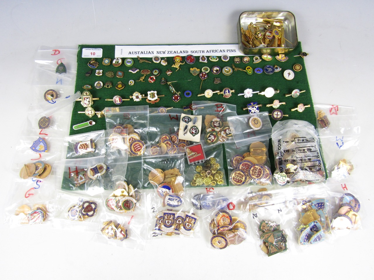 A quantity of bowling club lapel badges including Australia and South Africa etc.