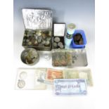 A quantity of coins including pennies and foreign bank notes etc.