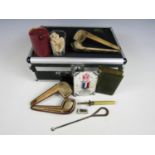 Sundry collectors' items including a protector case, a vintage medicine glass and two meerschaum