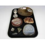 An ammonite dish together with other fossils and gems etc