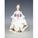 A Royal Doulton figurine Country Rose