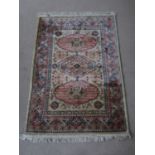 A Modhumita wool rug, 182 x 121 cm