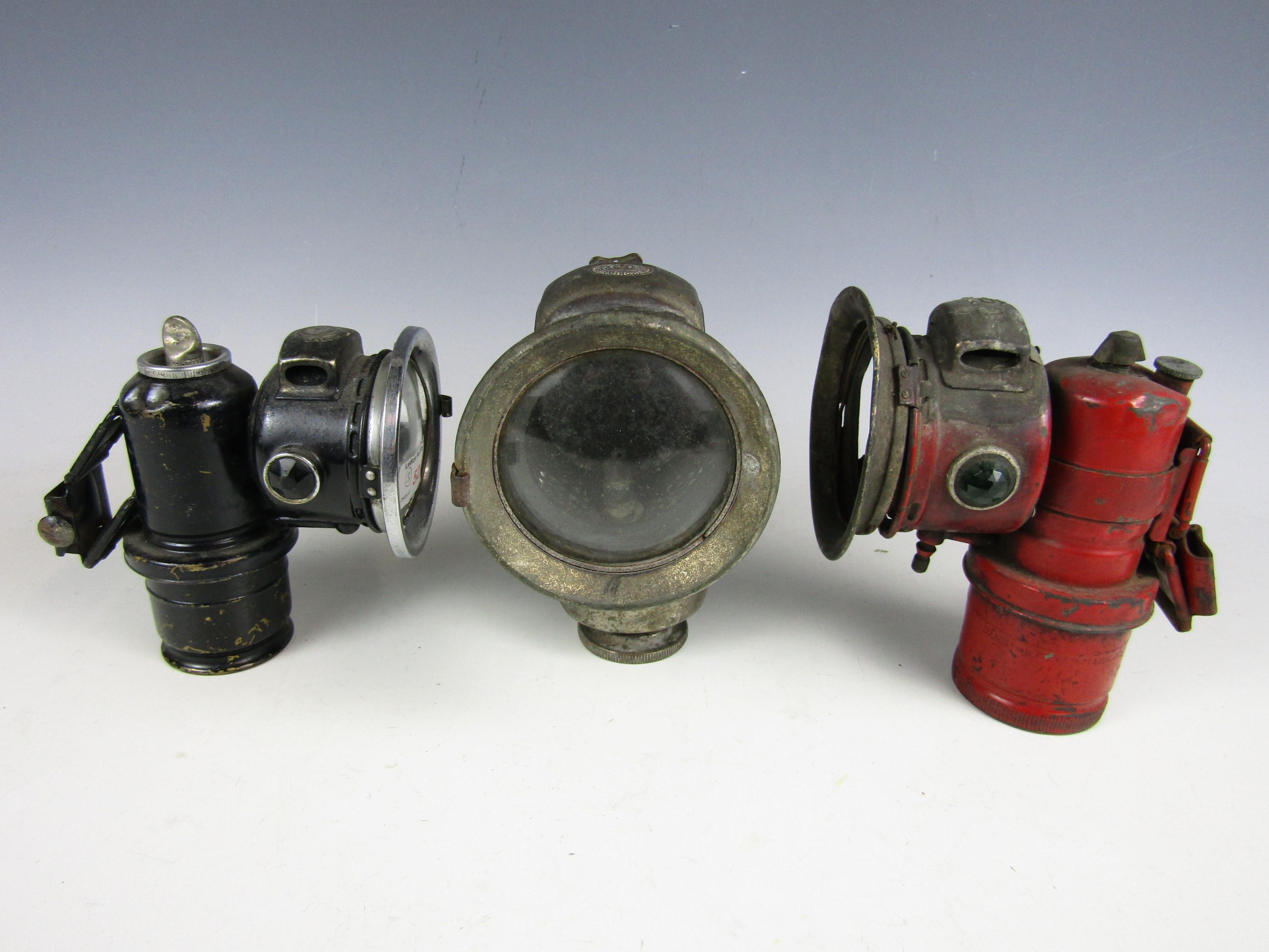 A GPO and two other vintage carbide lamps
