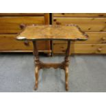 A reproduction walnut occasional table